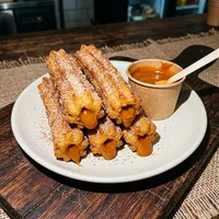 Churros con dulce de leche, Empanadas Doña Chela