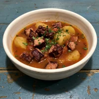 Pulpo guisado, Taberna El Puchero