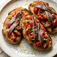 Bruschetta con stracciatella, Bufala & Basilico