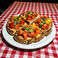 Bruschetta al pomodoro, Er Mestolo