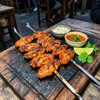 Alitas a la brasa, Asadero El Carbón