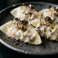 Jakobsmuschel-Jiaozi mit Trüffel (4 Stück), Kaiserente