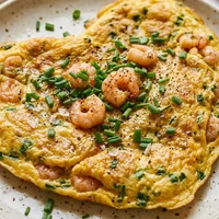 Omelette de camarón, Mar y Huerto