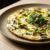 Omelette de hierbas y queso de cabra, Grano Tostado