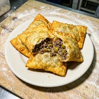 صينية سمبوسة لحم, لقمة الضيف