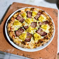 Lomito y morrones, El Tano Pizzero