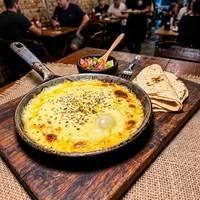 Queso Fundido, Pescadería Baja